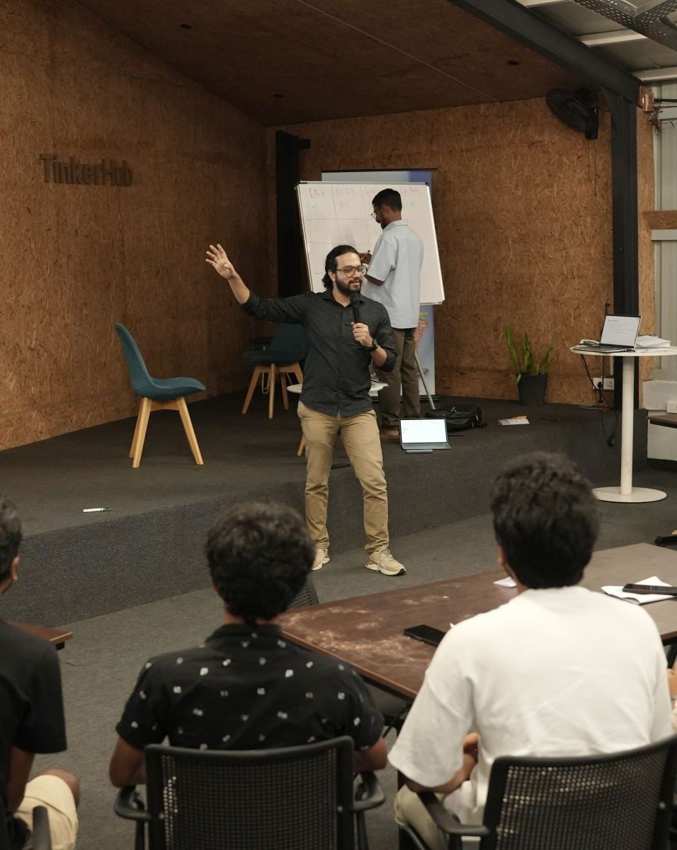 Anand S Unni running a public policy game at TinkerHub
