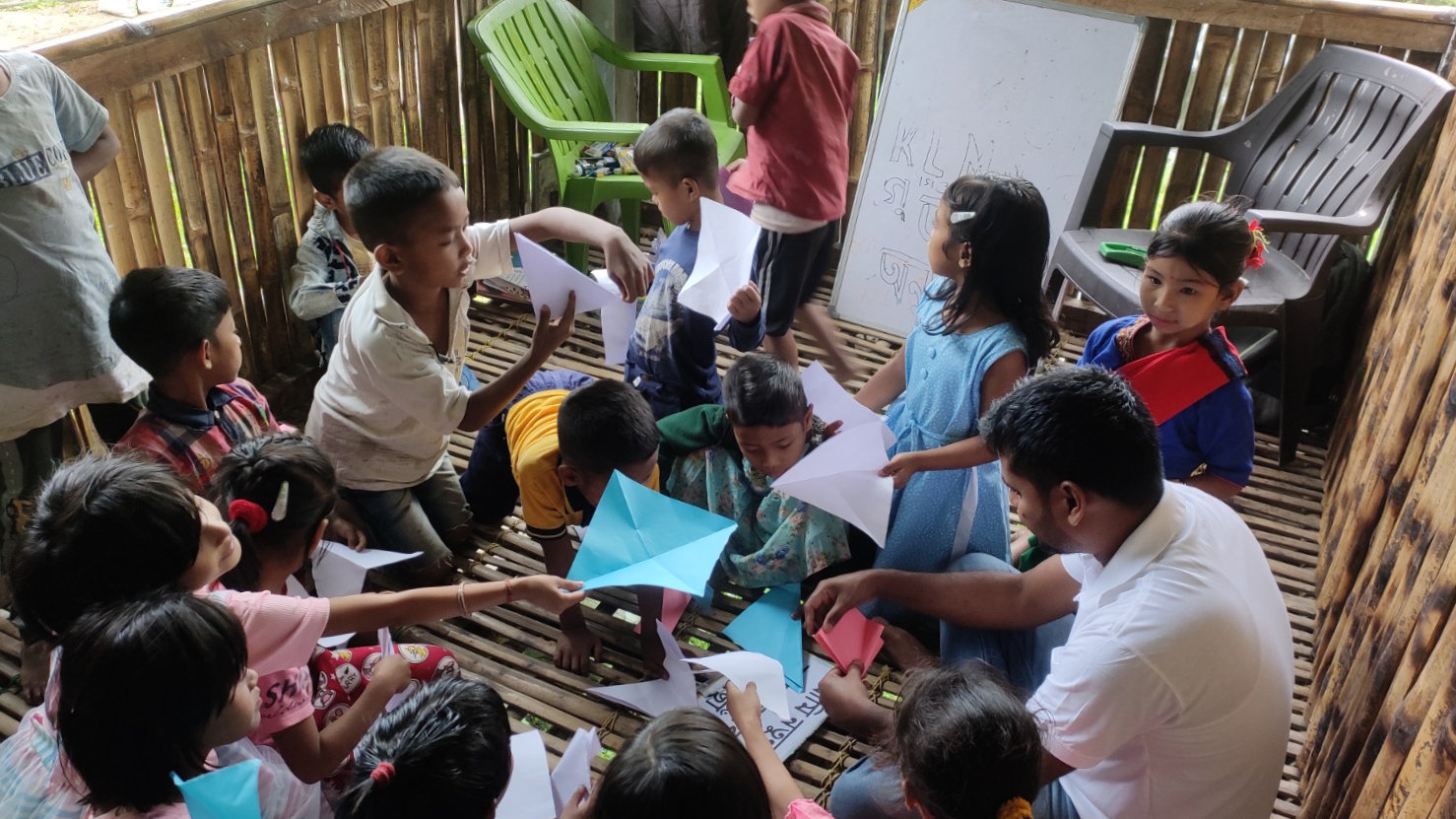 An NPoC researcher interviews a family in their home