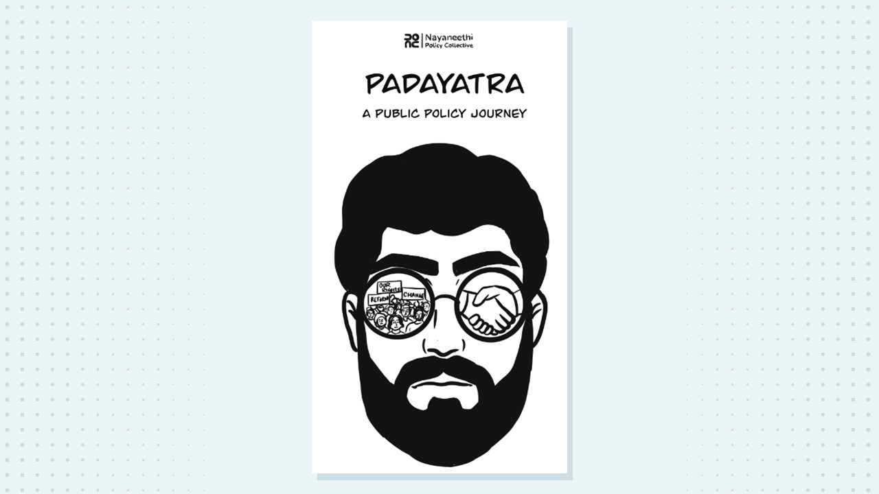 Padayatra comic cover: a bearded man whose glasses reflect a protest and a handshake